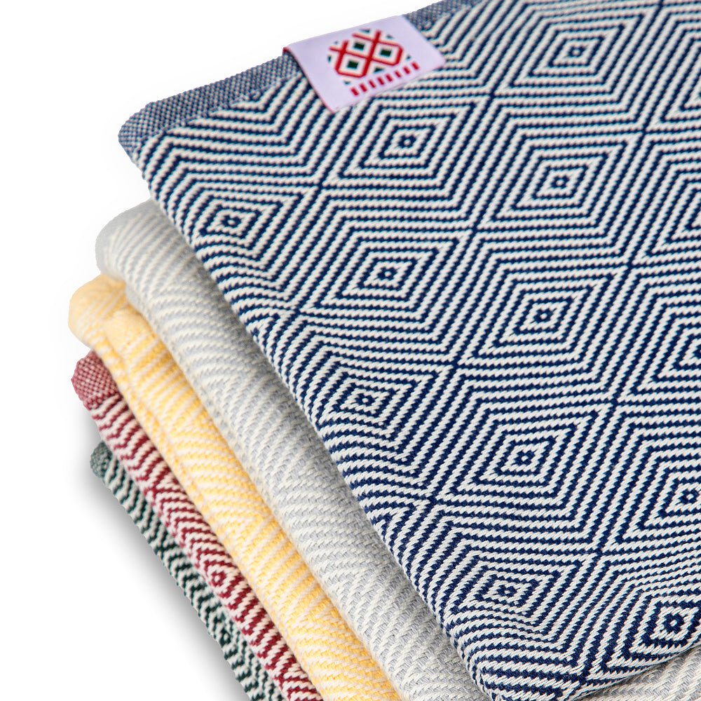 4 sets of Portokala hand towels and bath towels