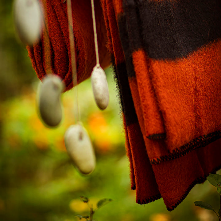 Thick wool blanket Rainbow VII in brick red with a black stripe-Balkanova